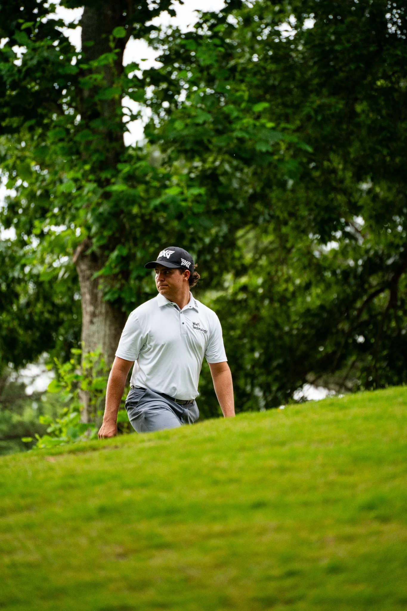 Golfer walking at Hawks Ridge during U.S. Open Final Qualifying